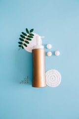 Mockup Spa bottles on blue background. Concept natural organic cosmetics. Copy space.