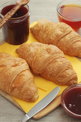 Croissants with marmalade and tea