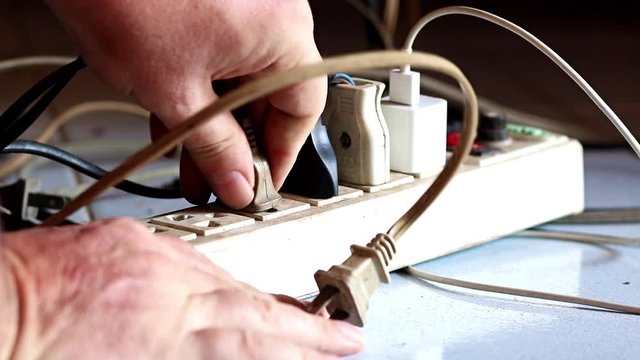 Pull out the plugs from the extended socket on the floor.