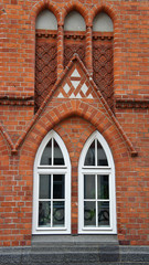 Detail of brick building, decoration windows, Lubeck, Germany
