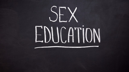 Sex education word written on chalkboard, human rights protection, awareness