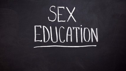 Sex education word written on chalkboard, human rights protection, awareness
