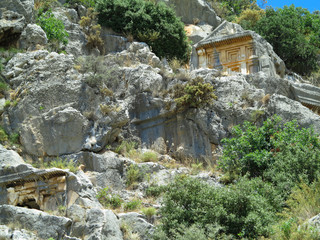 Naklejka premium Ancient lycian Myra rock tomb ruins in Demre, Antalya.