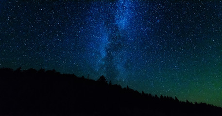 Night photos in the Ukrainian Carpathian Mountains with a bright starry sky and the Milky Way