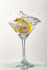 Glass, Lemon And Splash Of Water