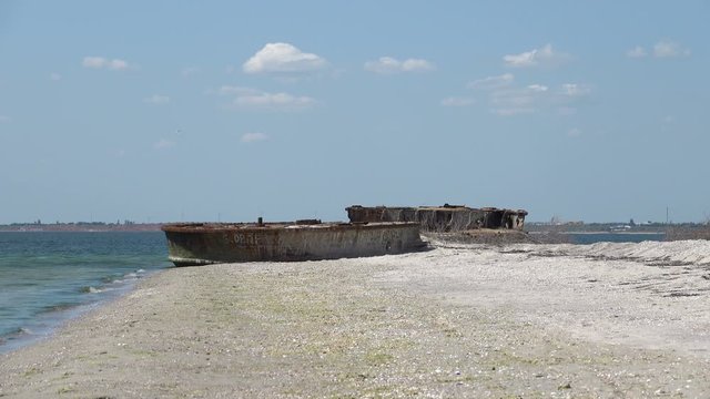 Old sunken rusty barge on the Black Sea
