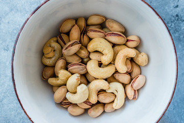 Cashew and Siirt Pistachios in Ceramic Bowl. Healthy Organic Snacks.