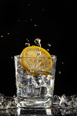 Glass Of Water, Ice And Lemon
