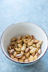Cashew and Siirt Pistachios in Ceramic Bowl. Healthy Organic Snacks.
