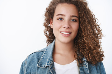 Attractive feminine tender young woman curly-haired chubby smiling silly look camera blue eyes girlfriend attend first date liking spend time together boyfriend have fun look happy white background