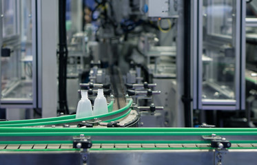 Picture of the plastic industrial machine that is working.