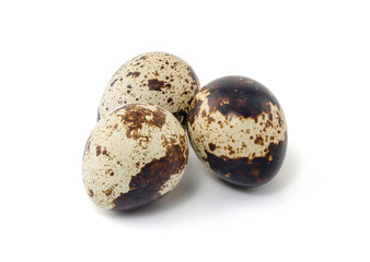 Quail eggs are isolated on a white background