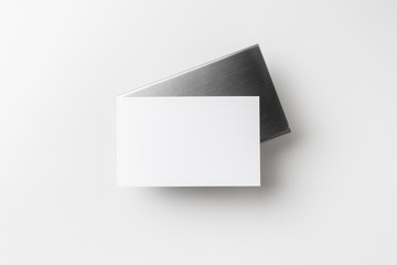 top view of business card with case on white