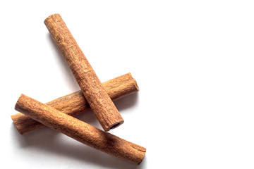 cinnamon sticks on white background