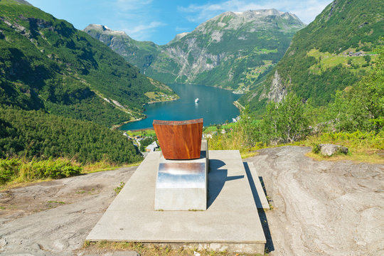 Geiranger fjord at Flydalsjuvet. Fjordsetet (the Fjord Seat) inaugurated by Queen of Norway in celebration of Fjord Norway regional tourist board's 10th anniversary.