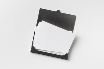 top view of business card with case on white