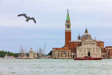 Venice, Italy - Sep 4, 2019: Grand canal architectural view. Saint George church (San Georgio basilica) and island.