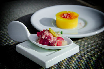 Modern tuna fish ceviche salad and orange gelee