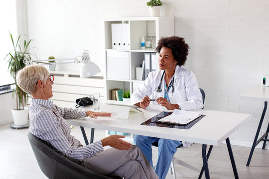 Mature woman at the doctor office come to consult about her health