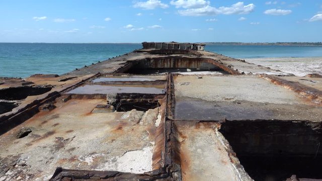Old sunken rusty barge on the Black Sea