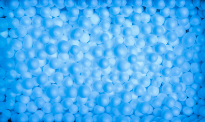 The backdrop is made of foam beads.