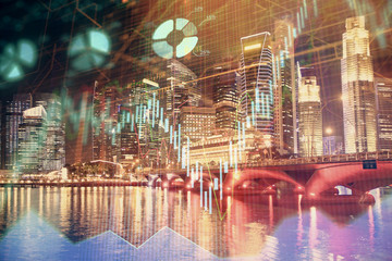 Financial chart on city scape with tall buildings background multi exposure. Analysis concept.