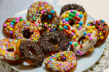 Donuts with frosting and sprinkles