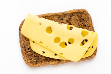 Sandwich with lettuce, cheese on white background.