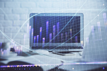 Stock market graph and table with computer background. Double exposure. Concept of financial analysis.