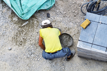 Heavy work for a construction worker on the site.