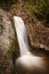 Long exposure shot of a beautiful small waterfall