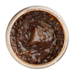 Top view of the jar of raw whipped honey with cacao and hazelnut