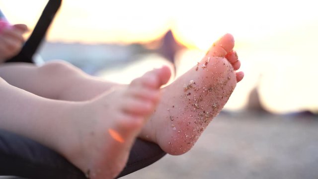Selective focus of barefoot feet small child girl