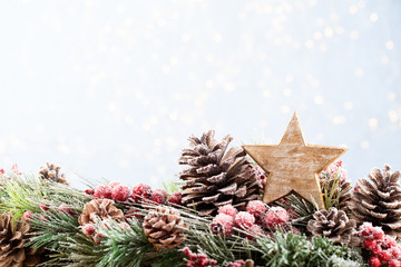 Christmas fir tree with bokeh background. Merry Christmas and Happy New Year. Christmas bokeh background with snow fir tree. Top view with copy space for your text.