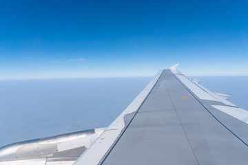 view on earth from the window of the airplane