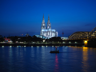 St Peter Cathedral and Hohenzollern Bridge over river Rhine in K