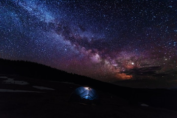 Night photos in the Ukrainian Carpathian Mountains with a bright starry sky and the Milky Way - obrazy, fototapety, plakaty