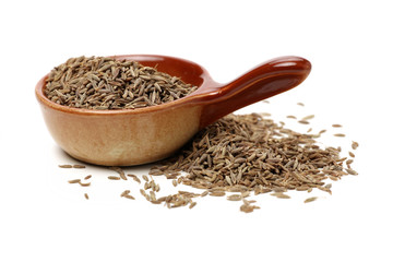 cumin seeds on white background