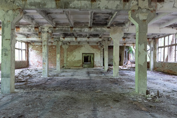 Fototapeta na wymiar Large industrial room. Large old abandoned room.