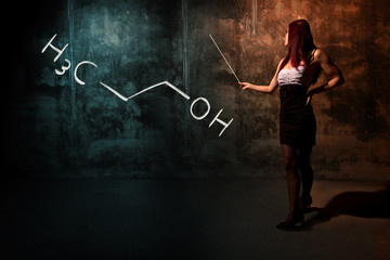 Sexy girl or secretary or female student presenting handdrawn chemical formula of Propanol n-propanol