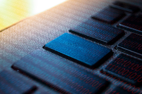 computer keyboard macro photo with binary codes for keywords background