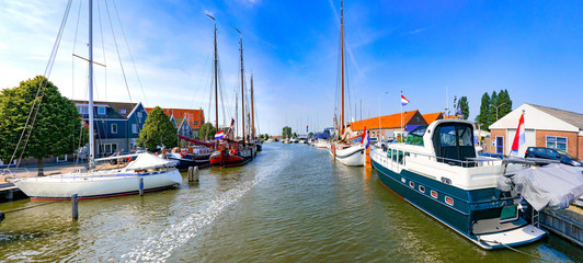 Yachts and sail ships in Monnickendam marina, waterland district, Netherlands © EKH-Pictures