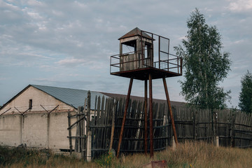 Old observation tower in abandoned Soviet Russian prison complex