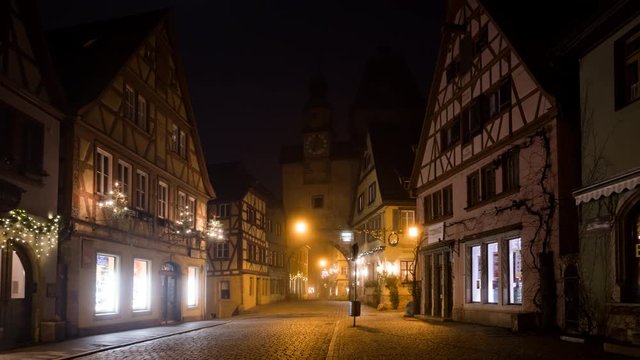 Early morning time lapse of Rothenburg ob der Tauber old town Weisser Turm at Christmas, Bavaria, Germany.
