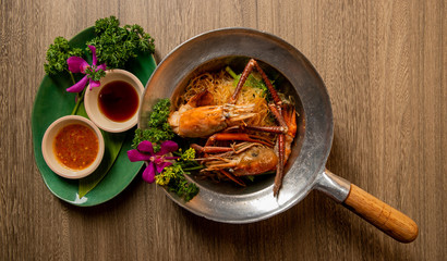 Casseroled prawns in the pot.