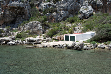 Boat house at the beautiful Cales Coves on the island of Menorca