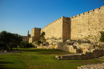Fototapeta na wymiar Jerusalem old city protection walls ancient stone architecture UNESCO world famous heritage site for many tourist and sightseeing 