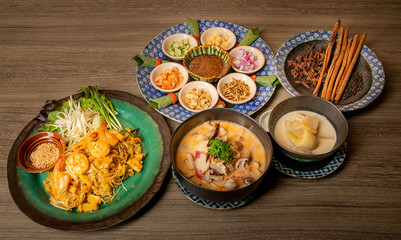 Thai food on the wooden board.