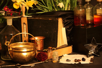 Witchcraft Peacock feathers and candle background.