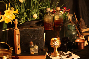 Witchcraft Peacock feathers and candle background.